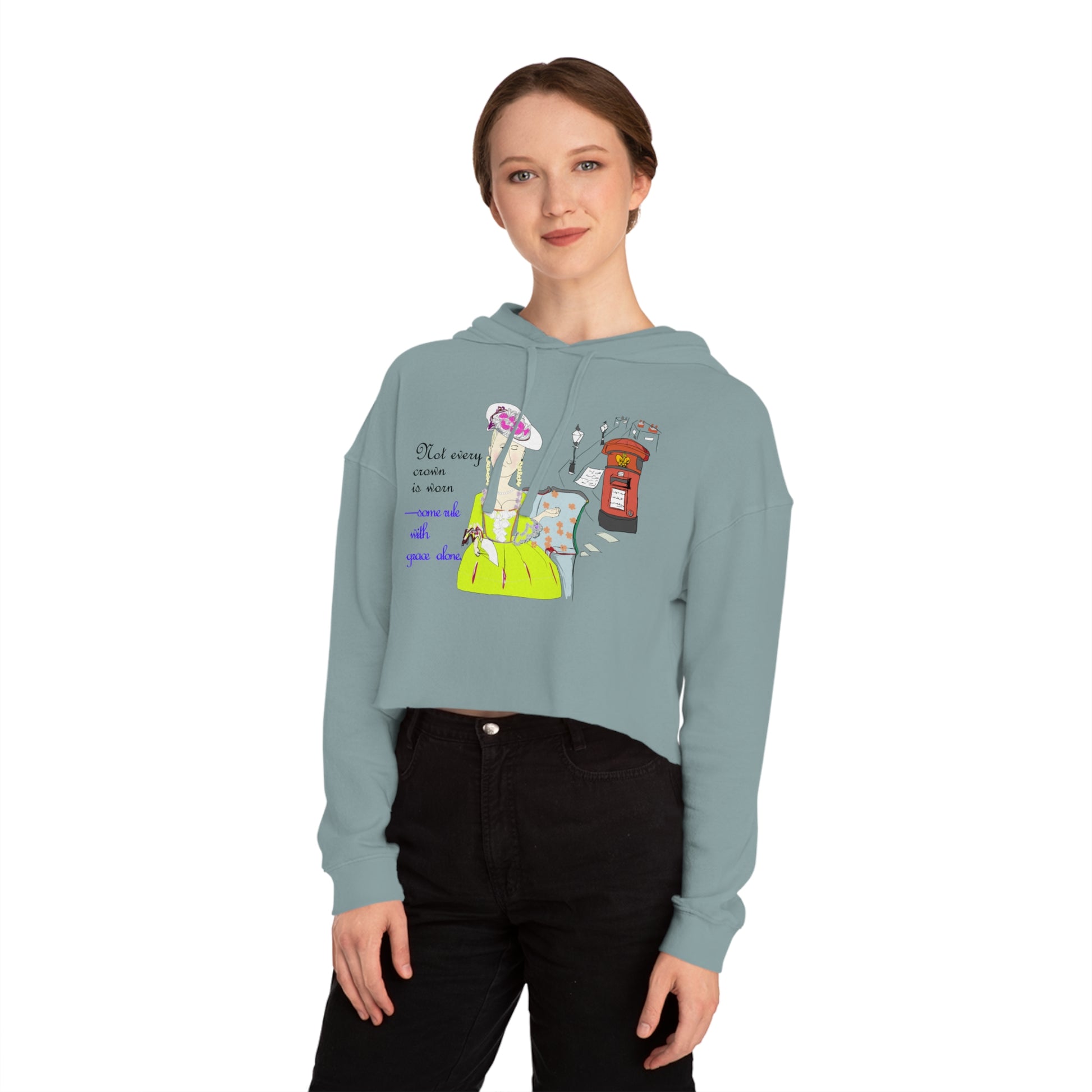 Woman wearing a light blue hoodie with a colorful vintage dressed English lady graphic and text on a white background