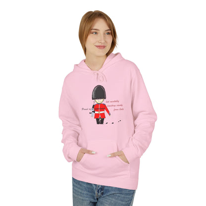 Person wearing a pink hoodie with a playful royal guardsman graphic design on a white background