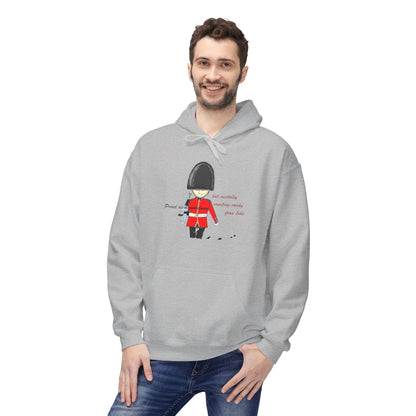 Man wearing a gray hoodie with a playful royal guardsman graphic design on a white background