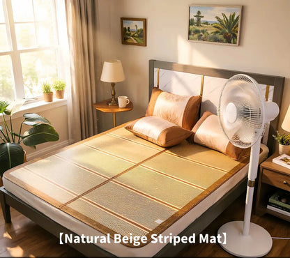 Bed with a natural beige striped mat, fan, and decor in a bedroom.