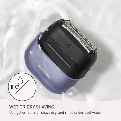 Panasonic electric shaver with water resistance symbol on a wet background