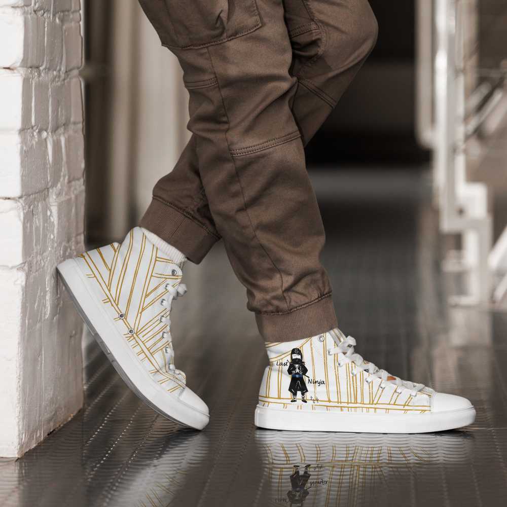 White yellow stripe sneakers with a playful ninja graphic design and white laces, featuring a text 'Last ninja' on a reflective floor.