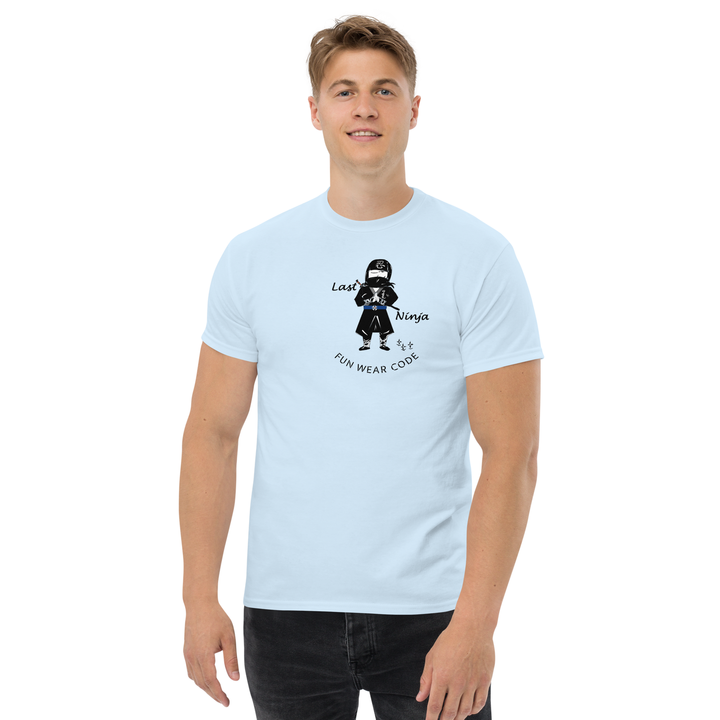 Person wearing a light blue t-shirt  with a playful "Last Ninja" graphic design and text "FUN WEAR CODE" on a white background