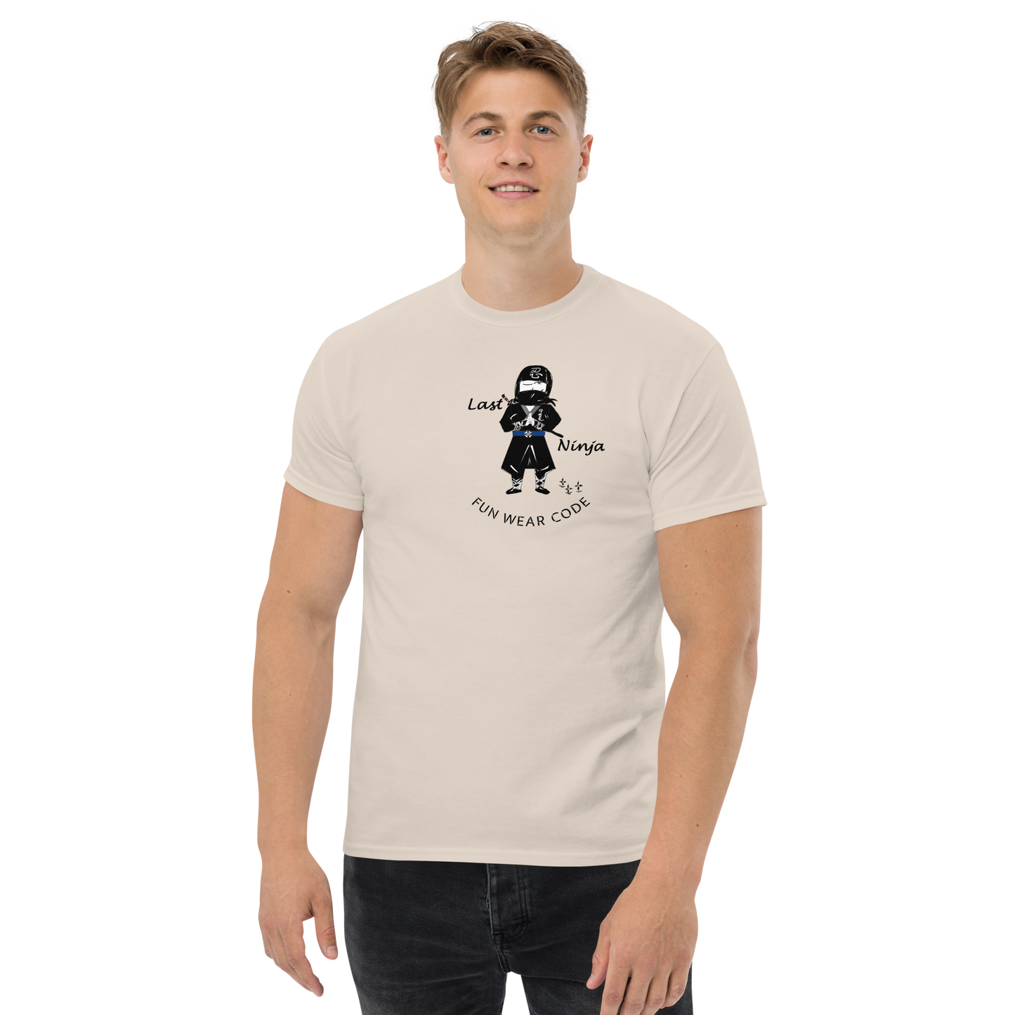 Man wearing a beige t-shirt with a playful "Last Ninja" graphic design and text "FUN WEAR CODE" on a white background