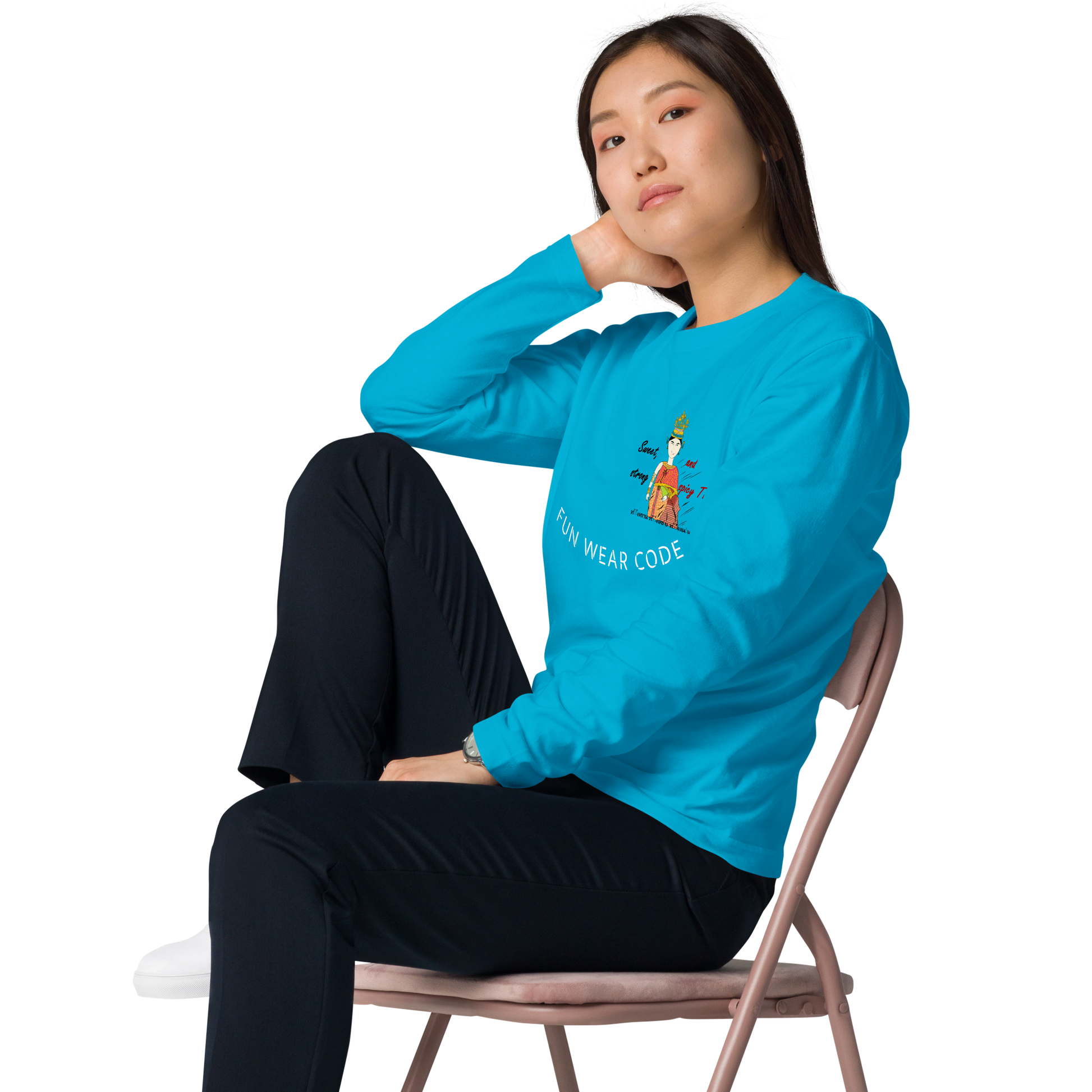 Person wearing a blue long-sleeve shirt with a playful Thai lady graphic and text "fun wear code" sitting on a chair against a white background
