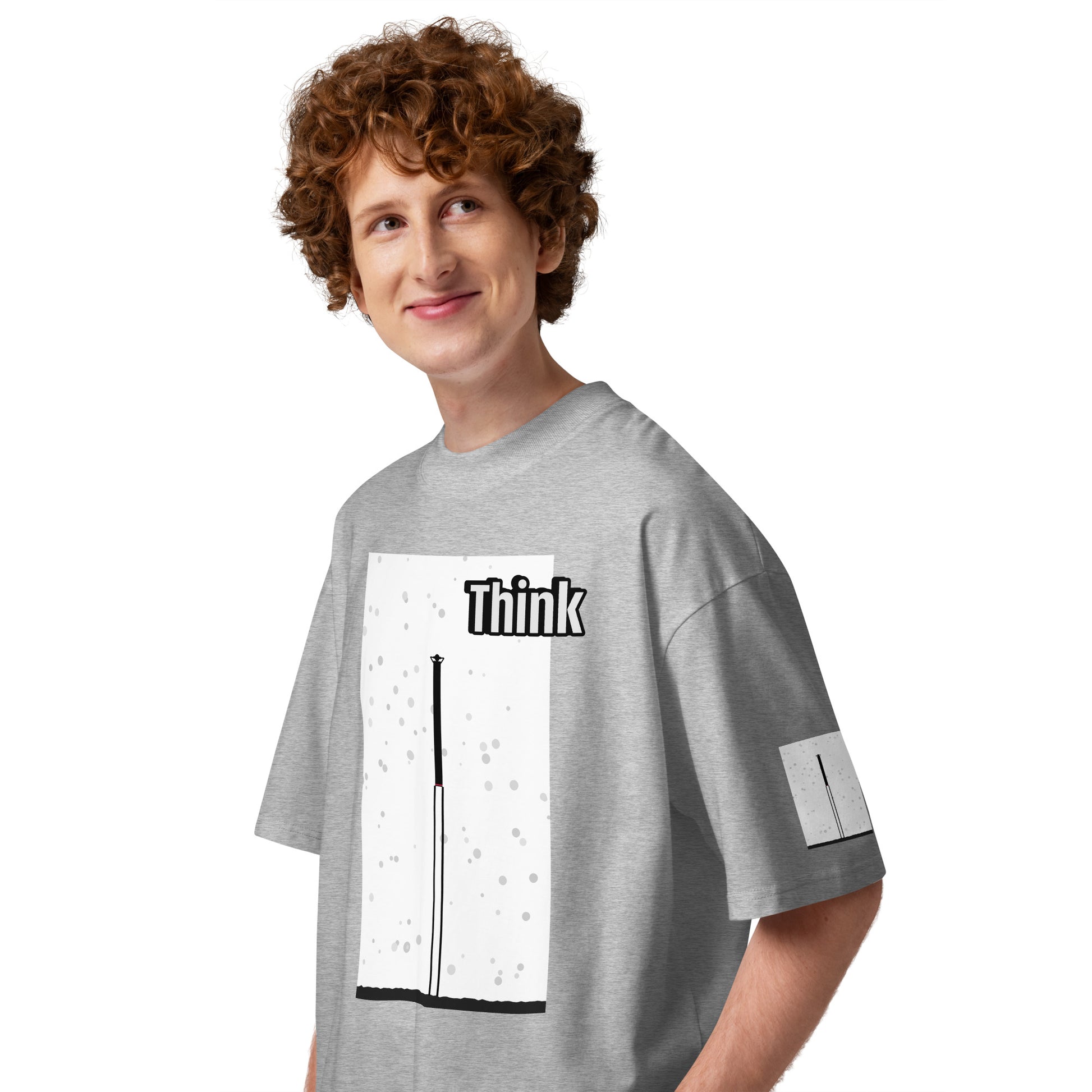 Person wearing a gray t-shirt with an abstract long-leg human graphic design and text on a white background