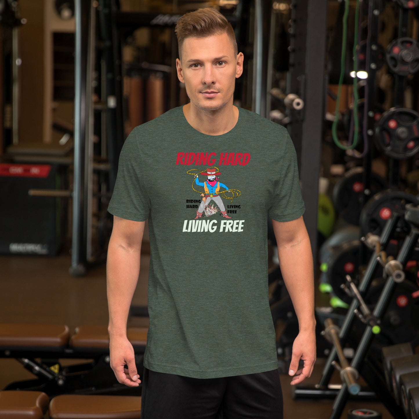 Man wearing a green t-shirt with a cowboy graphic design in a gym setting
