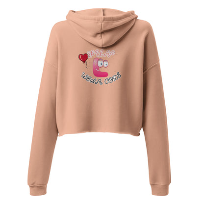 Back view of a peach cropped hoodie with a FUN WEAR CODE graphic design on a white background