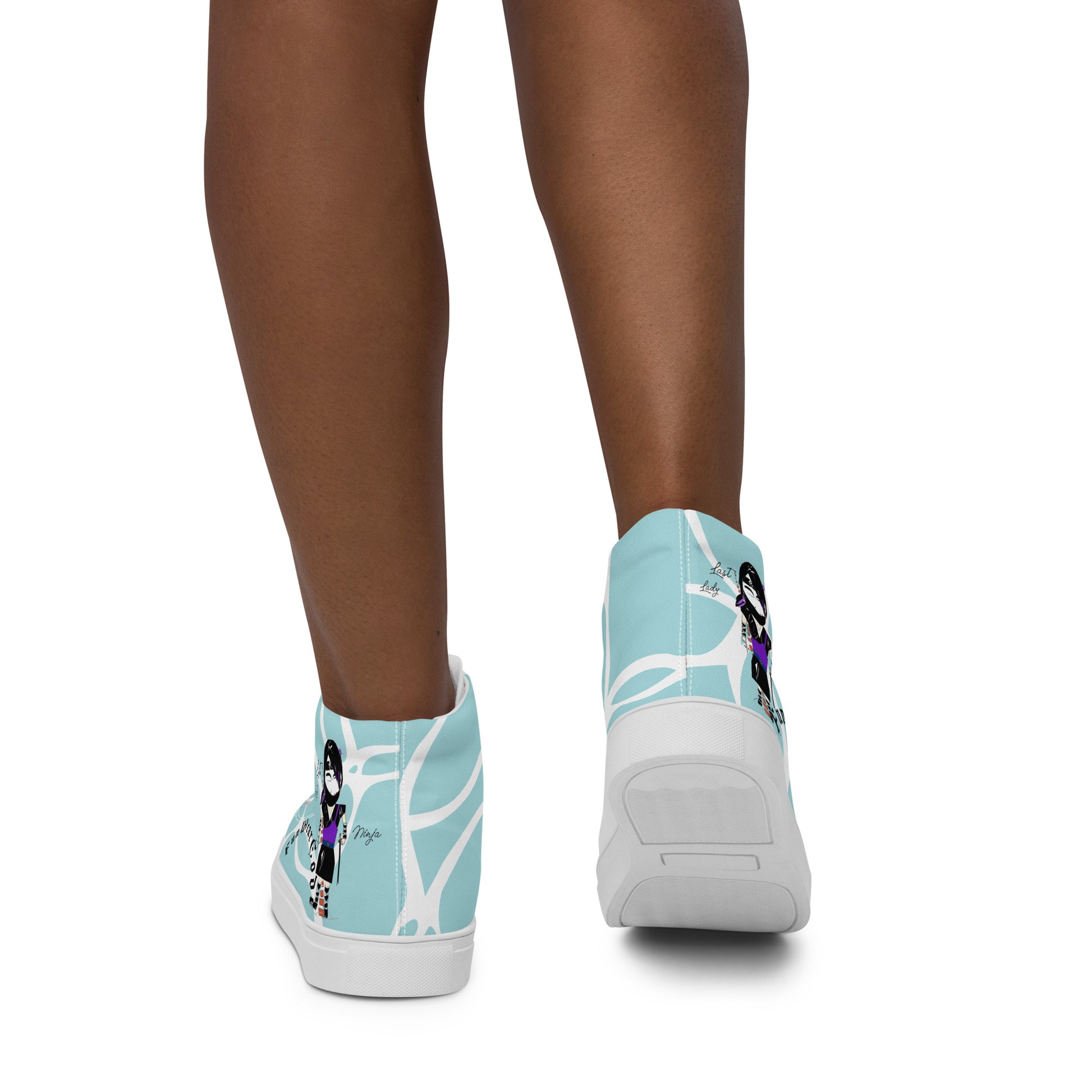 Light blue sneakers with a ninja graphic and 'Fun Wear Code' text logo worn by a person on a white background